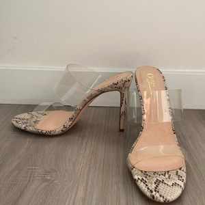 Clear snakeskin heel